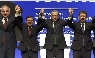 Cumhurbaşkanı Erdoğan Tütüncü’nün elini havaya kaldırdı