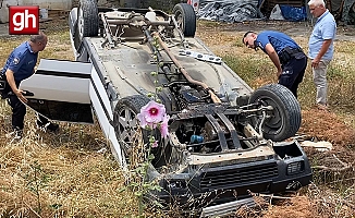  Boş araziye devrilip ters dönen otomobilde yaralı aradılar